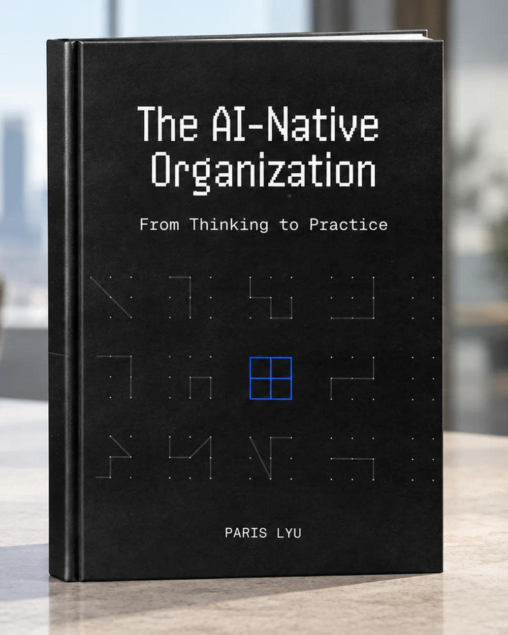 The AI-Native Organization, hardcover, standing on a desk